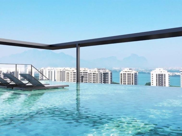 Lançamento na Avenida Salvador Allende, ao lado do Condomínio Ilha Pura na Barra da Tijuca, será construído em uma das áreas mais bonitas da região e os futuros moradores irão contar com uma bela vista da Lagoa de Jacarepaguá. Cercado por belas paisagens, de um lado a Lagoa de Jacarepaguá e do outro o verde da região. Você também vai estar à poucos minutos das praias da Barra da Tijuca e do Recreio dos Bandeirantes umas das mais belas do Rio de Janeiro. Lazer na cobertura Rooftop Piscina adulto Piscina infantil Bar da piscina Sauna Churrasqueira com forno de pizza Salão de festas gourmet Fechadura biométrica Fechamento da varanda com vidro Estilo Wide e Duo Esquadrias de alumínio preto até o teto Acesso facilitado, com 2 Entradas. Av Salvador Allende e pela Estrada dos Bandeirantes